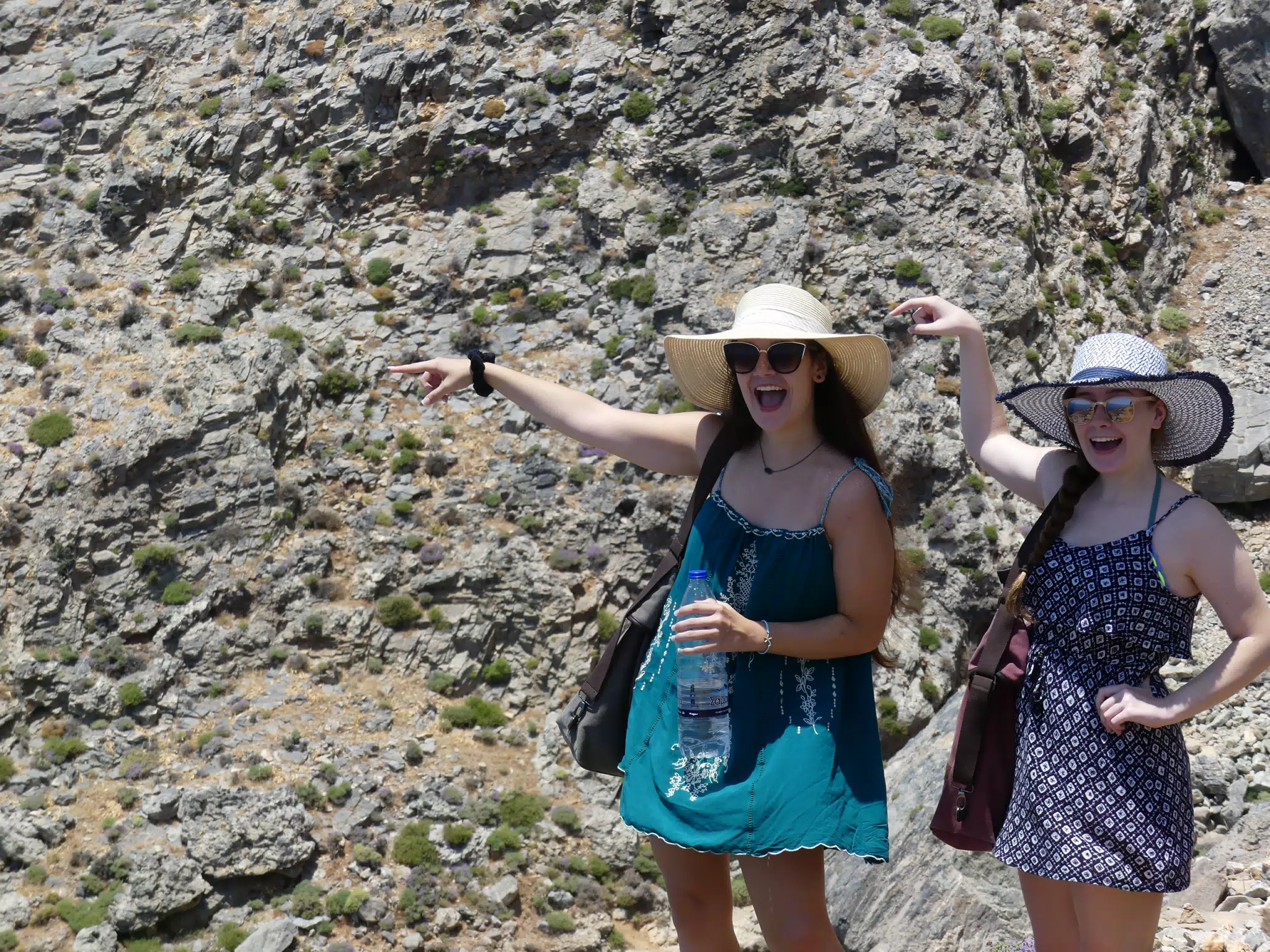 Emily & Madeline Pointing Down the Trail