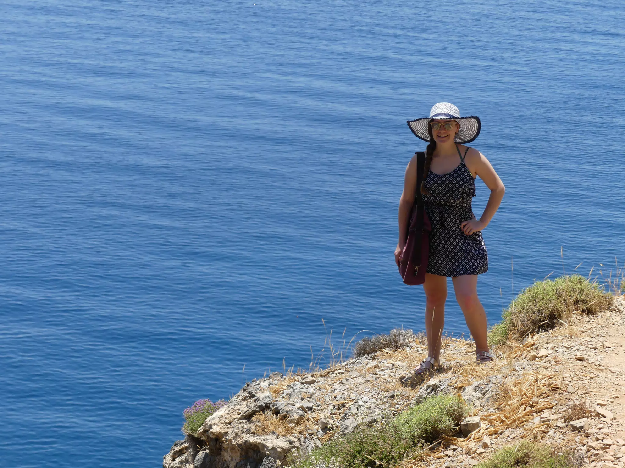 Madeline on Greek Beach Trail in Hat and Dress