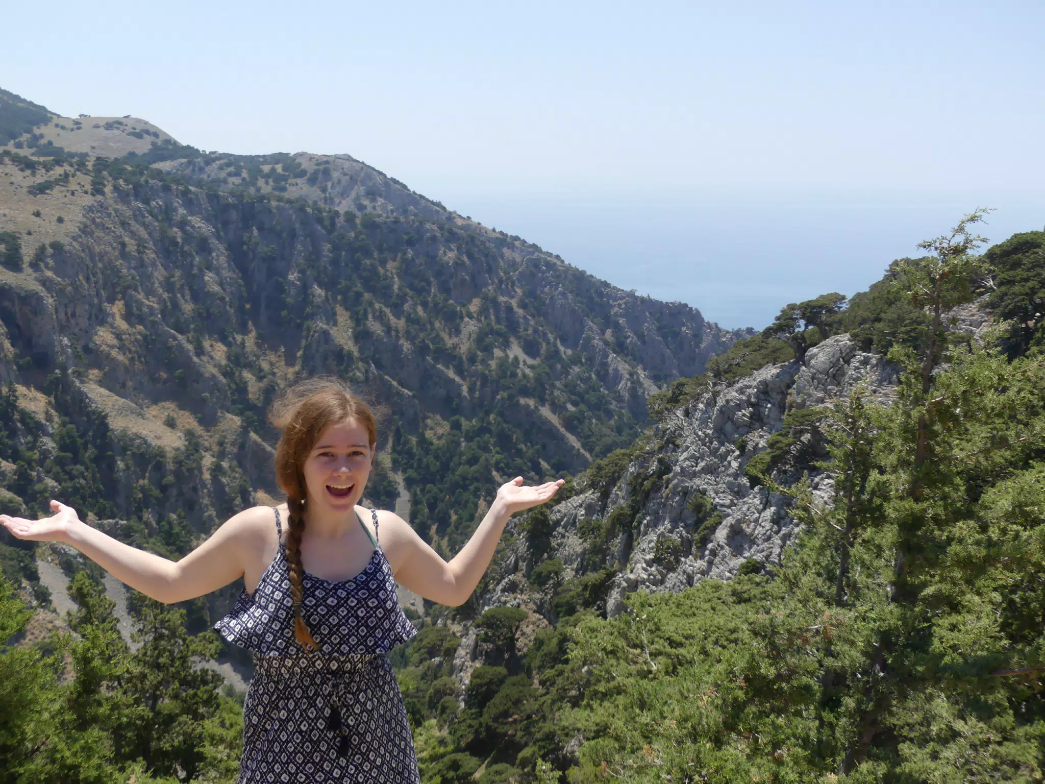 Girl Standing over Canyon on Crete