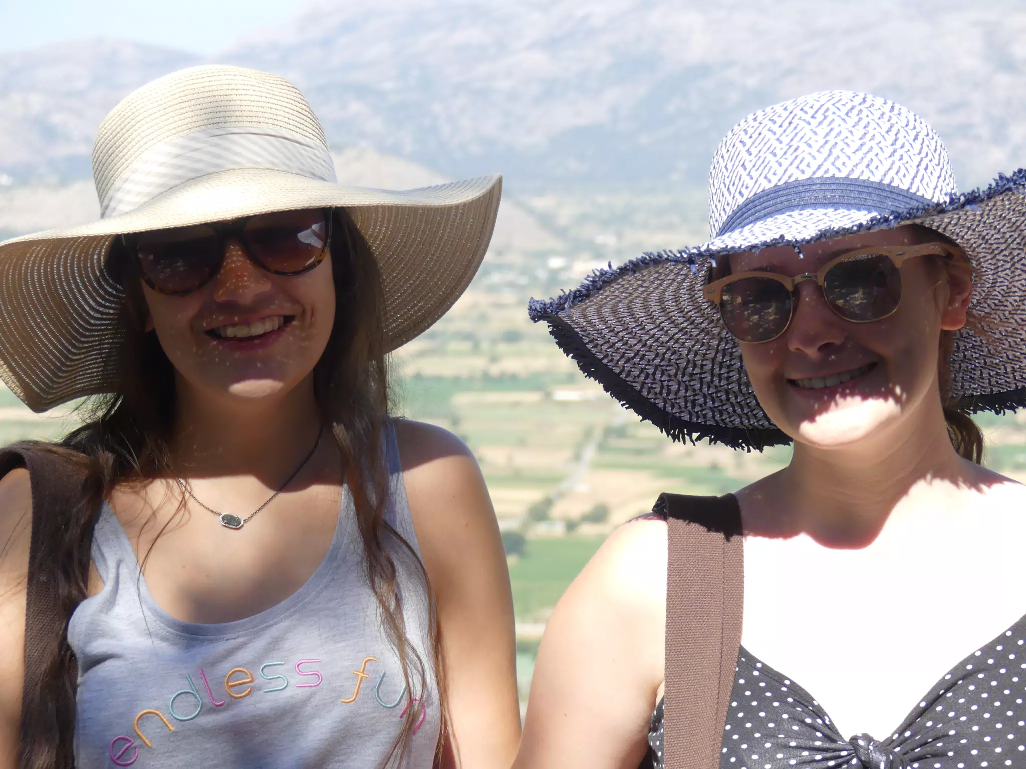 Emily & Madeline Posing Above the Lasithi Plateau