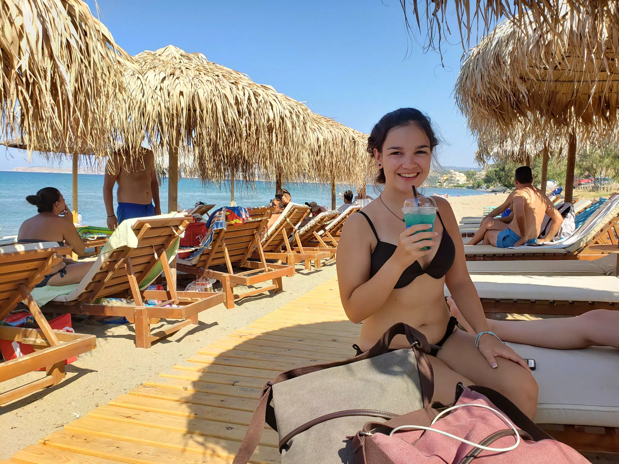 Emily with Cocktail on Kolatsos Beach, Crete
