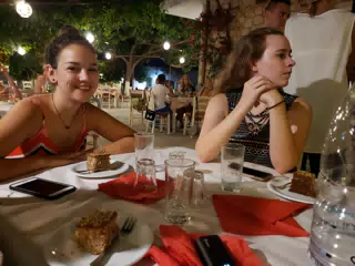 Emily & Madeline with Dinner at the Cretan Corner