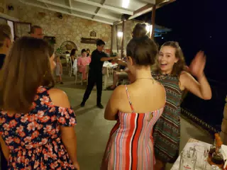 Madeline Excited to Dance at the Cretan Corner, Aptera
