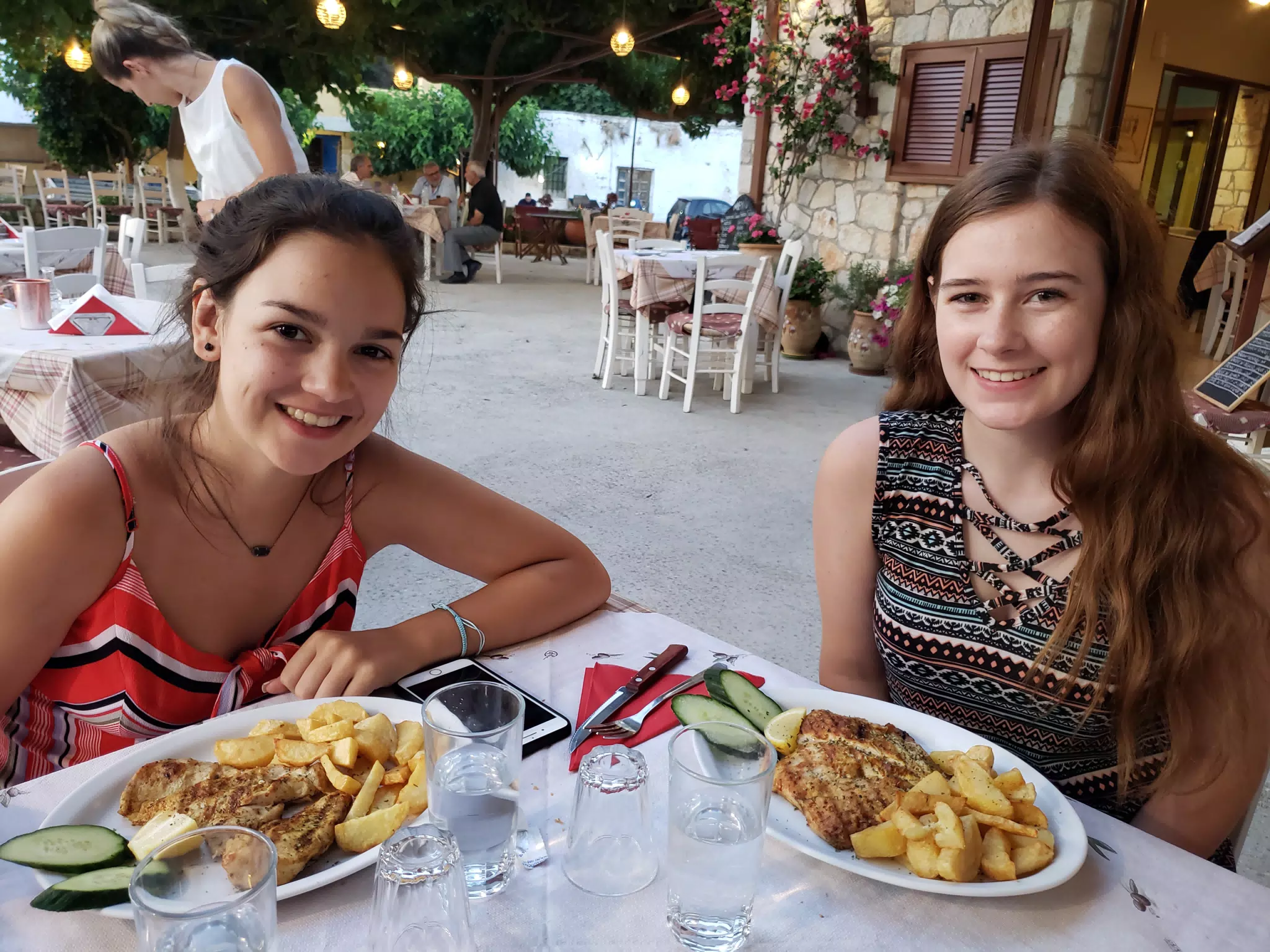 Emily & Madeline with Dinner at the Cretan Corner in Aptera