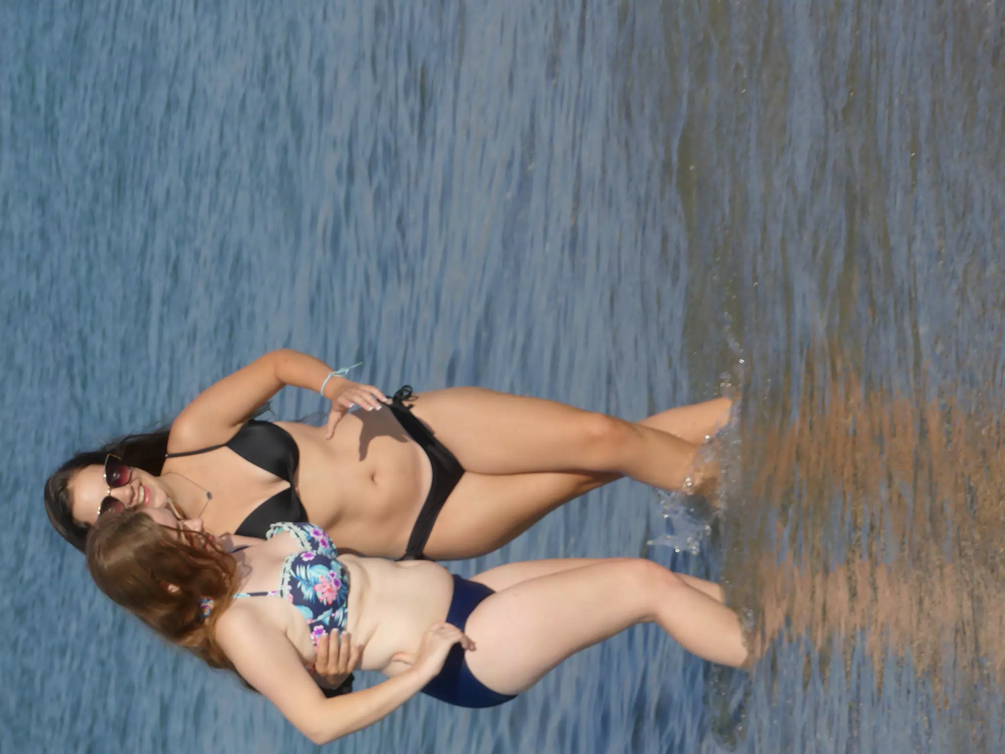 Girls Attempting to Pose on Beach