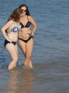 Girls Attempting to Pose on Beach