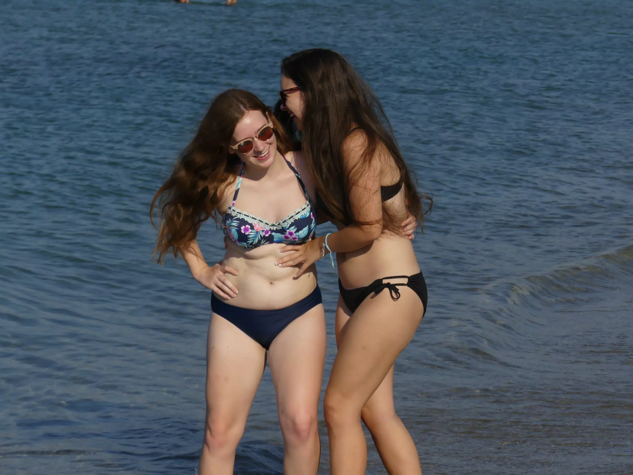 Girls Giggling on Beach