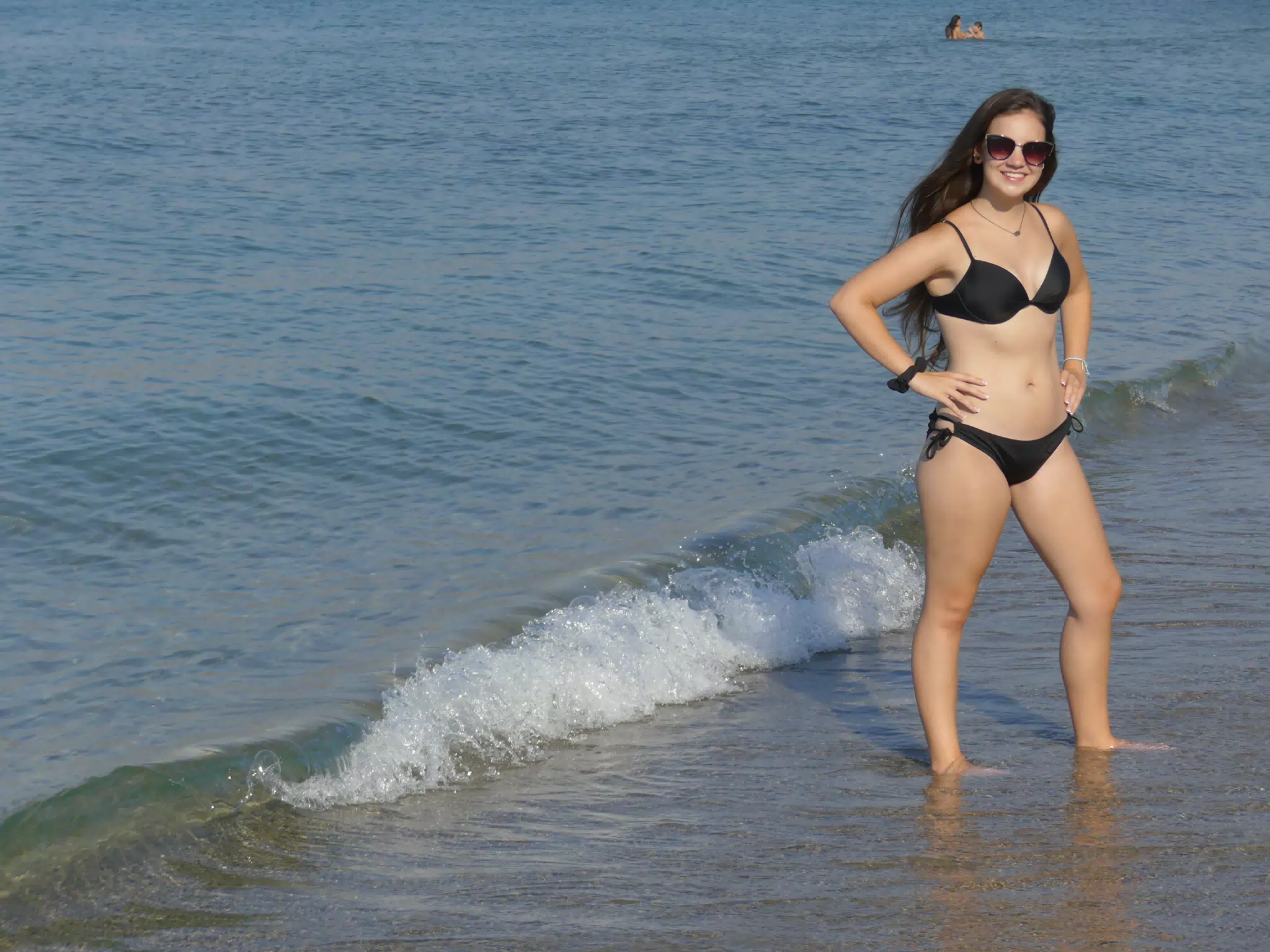Teen Girl in Swimsuit on Kolatsos Beach on Crete