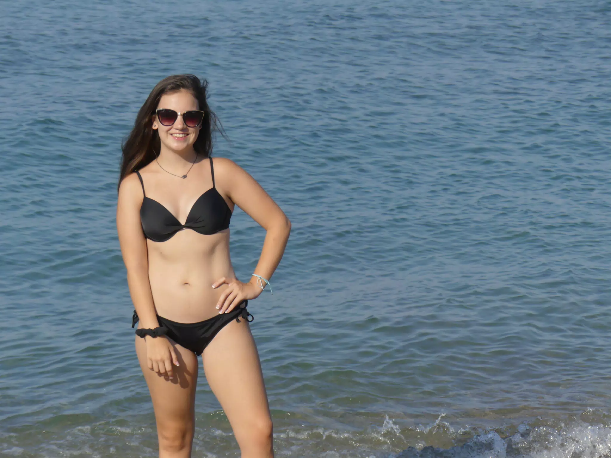 Emily with Hand on Hip in Aegean Sea on Kolatsos Beach on Create, Greece