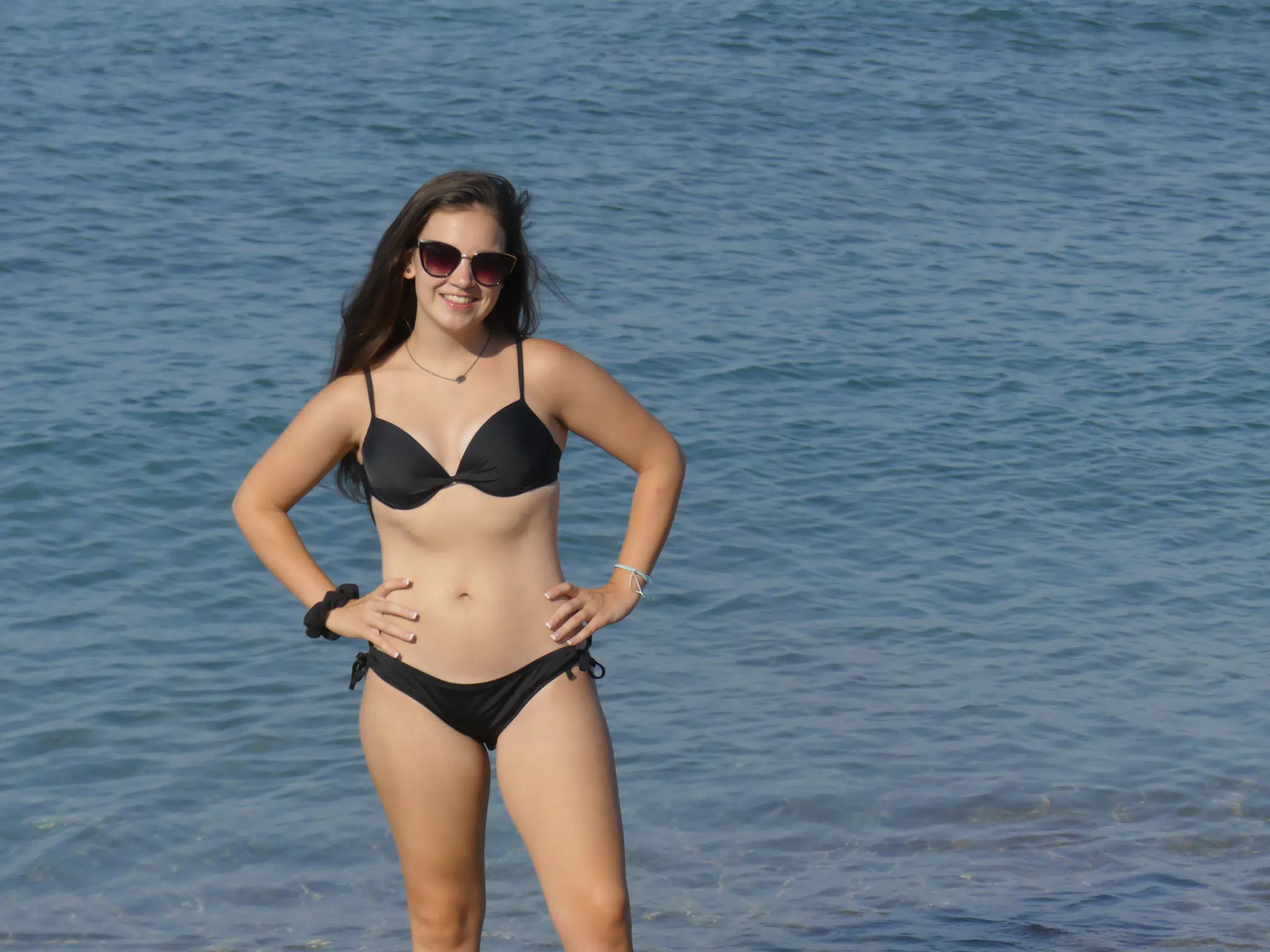 Teen in Swimsuit on Cretan Beach
