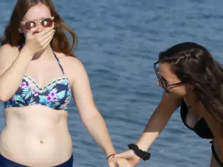 Madeline and Emily Grice on Beach on Crete