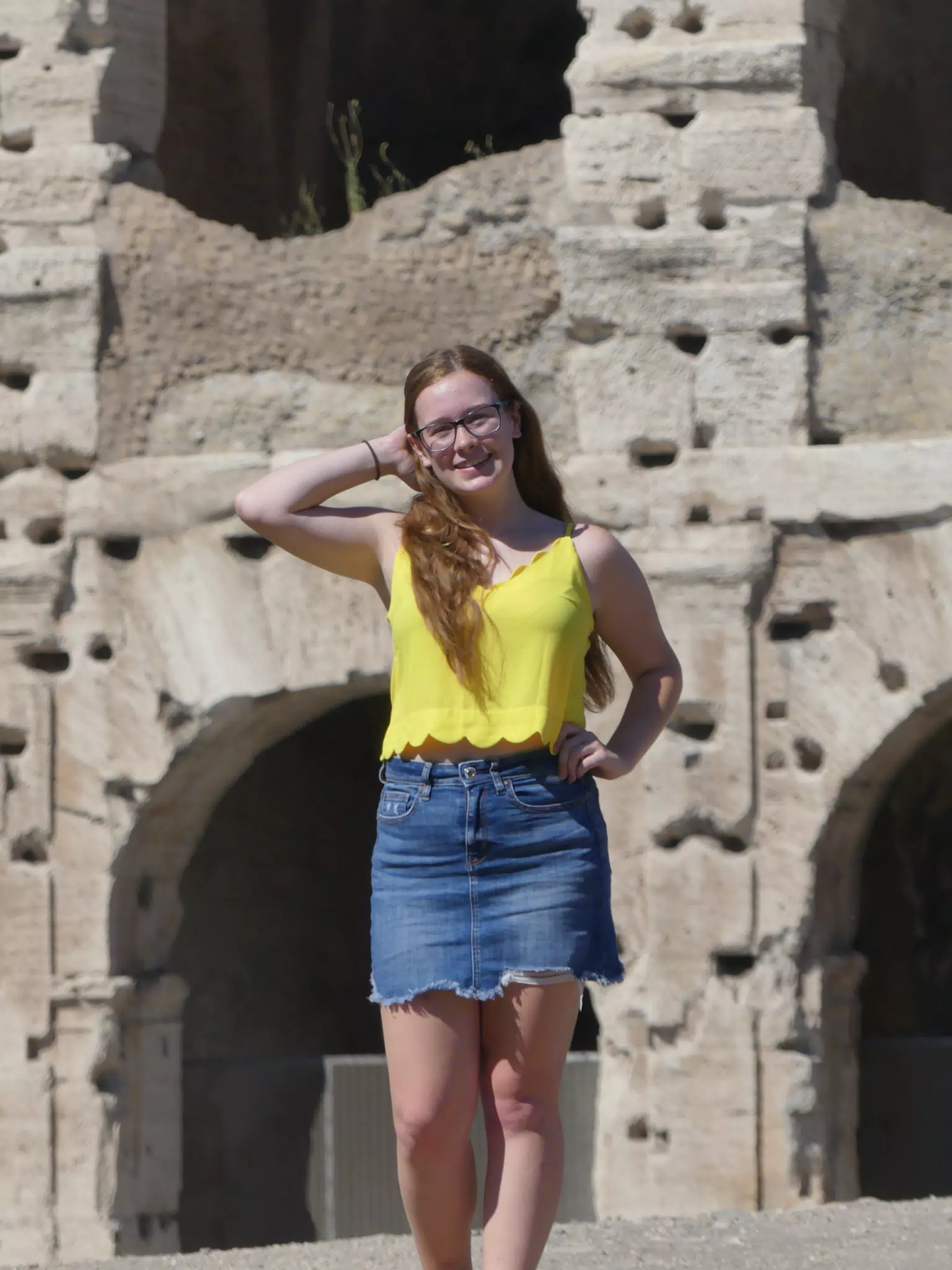 Teen in Yellow and Denim Skirt at Colosseum