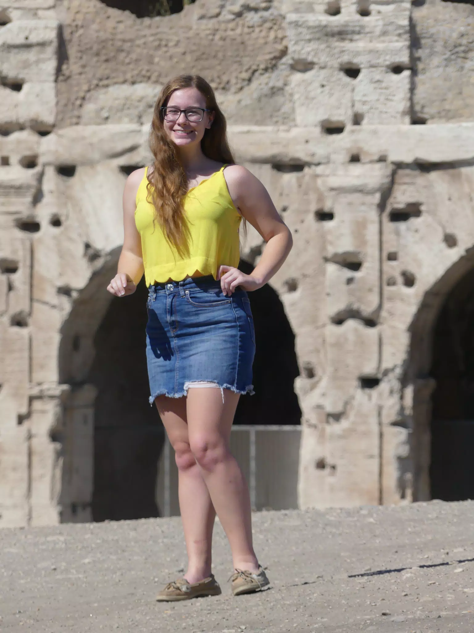 Teen in Denim Skirt at Colosseum in Rome