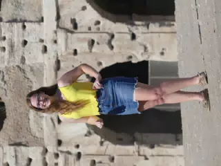 Teen in Denim Skirt at Colosseum in Rome
