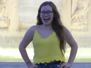 Excited Teen by Fountain