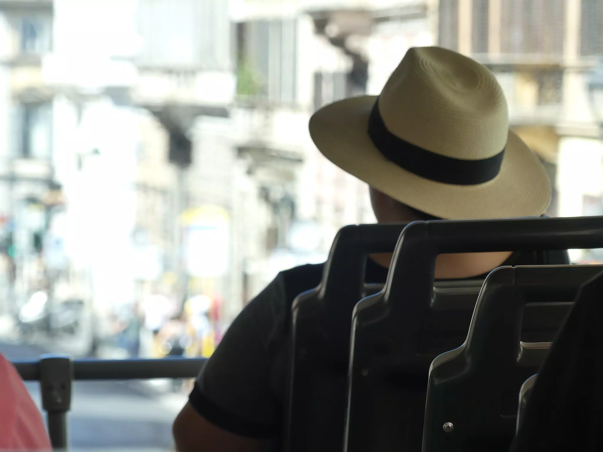 Dominica in Hat on Tour Bus