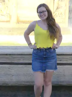 Girl in Yellow by Fountain