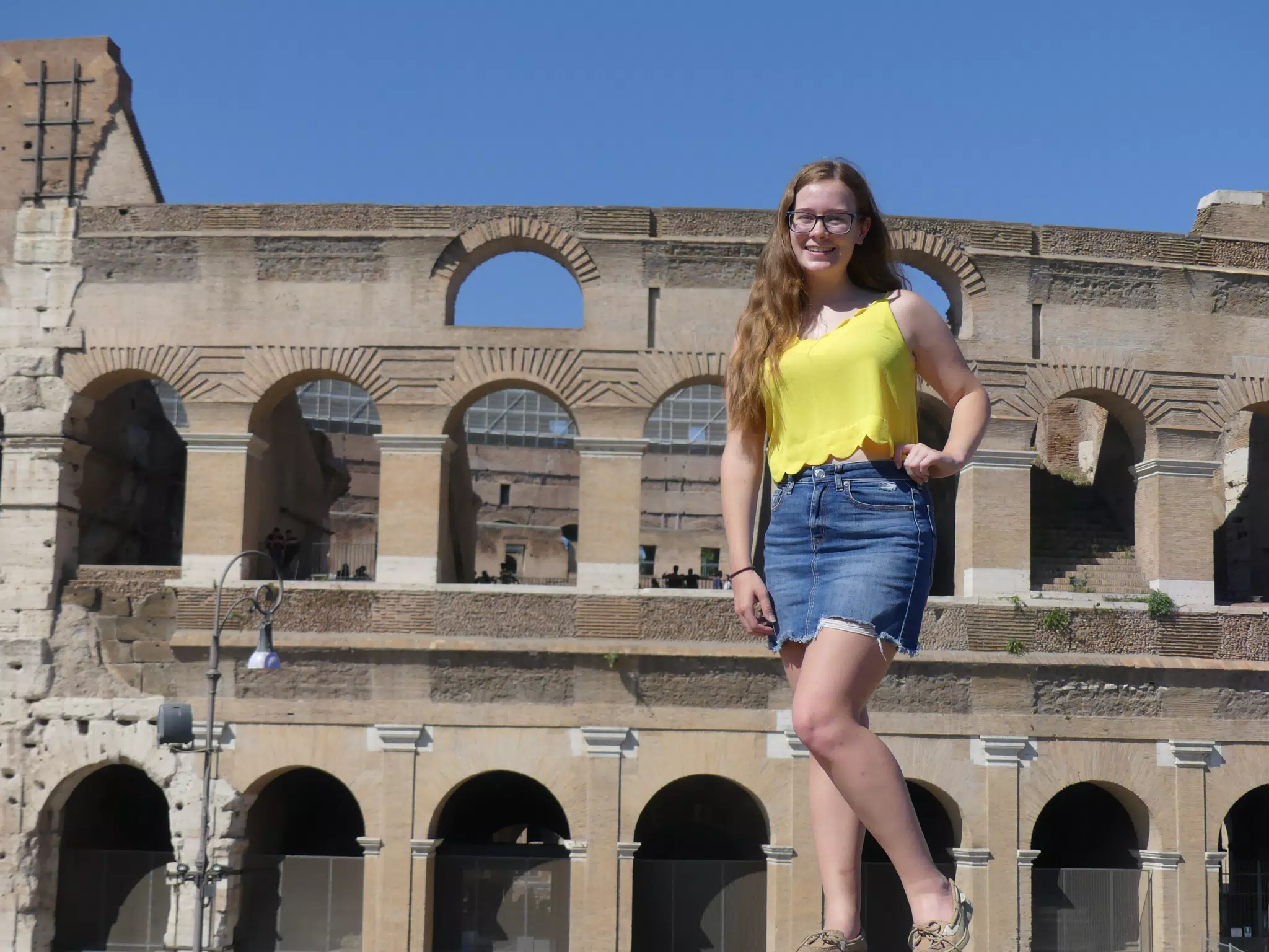 Teen in Yellow and Jean Skirt at the Colosseum