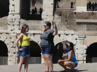 Madeline, Dominica, and Emily at the Colosseum in Rome