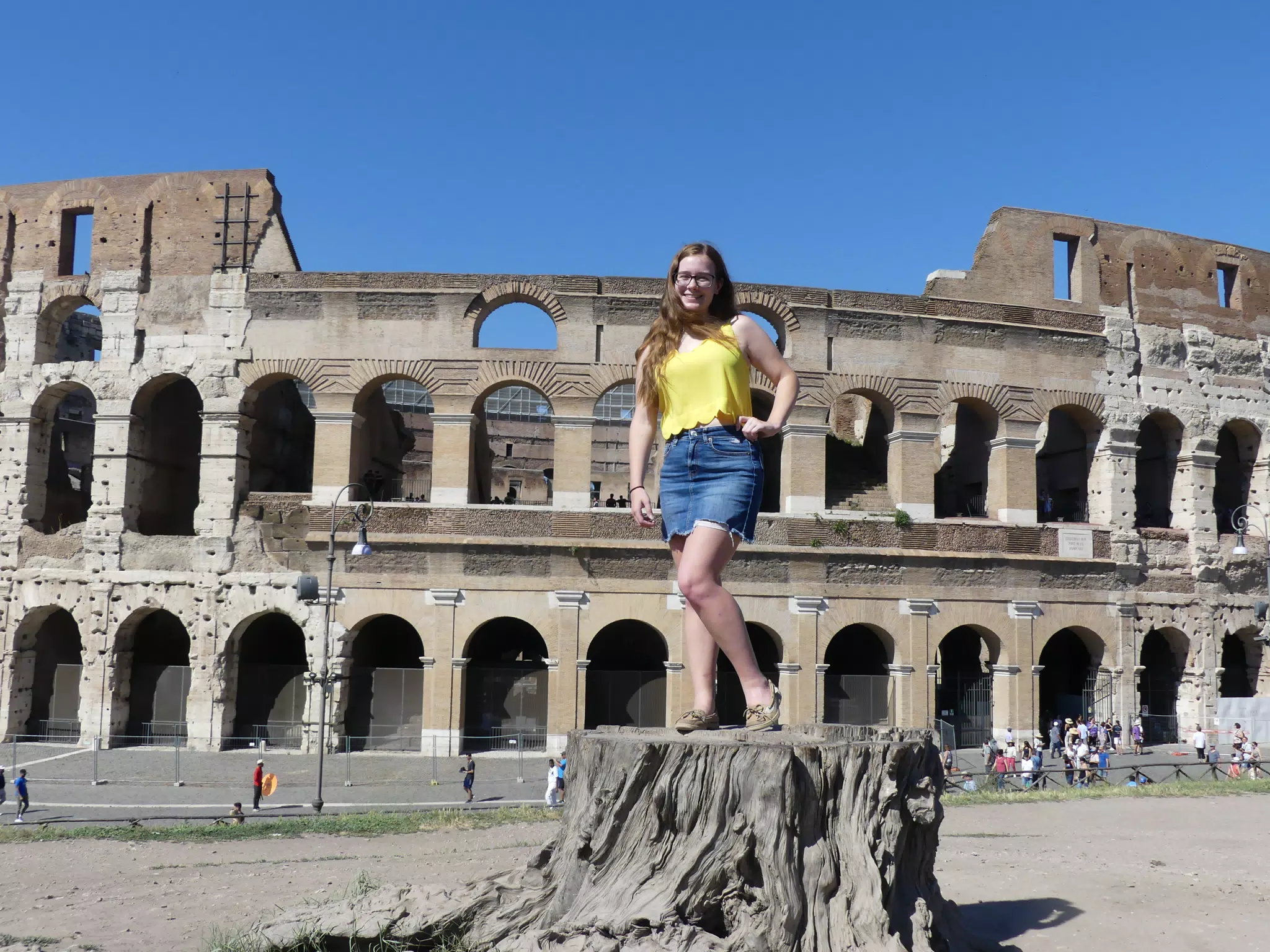 Madeline on Tree Stump at the Colosseum