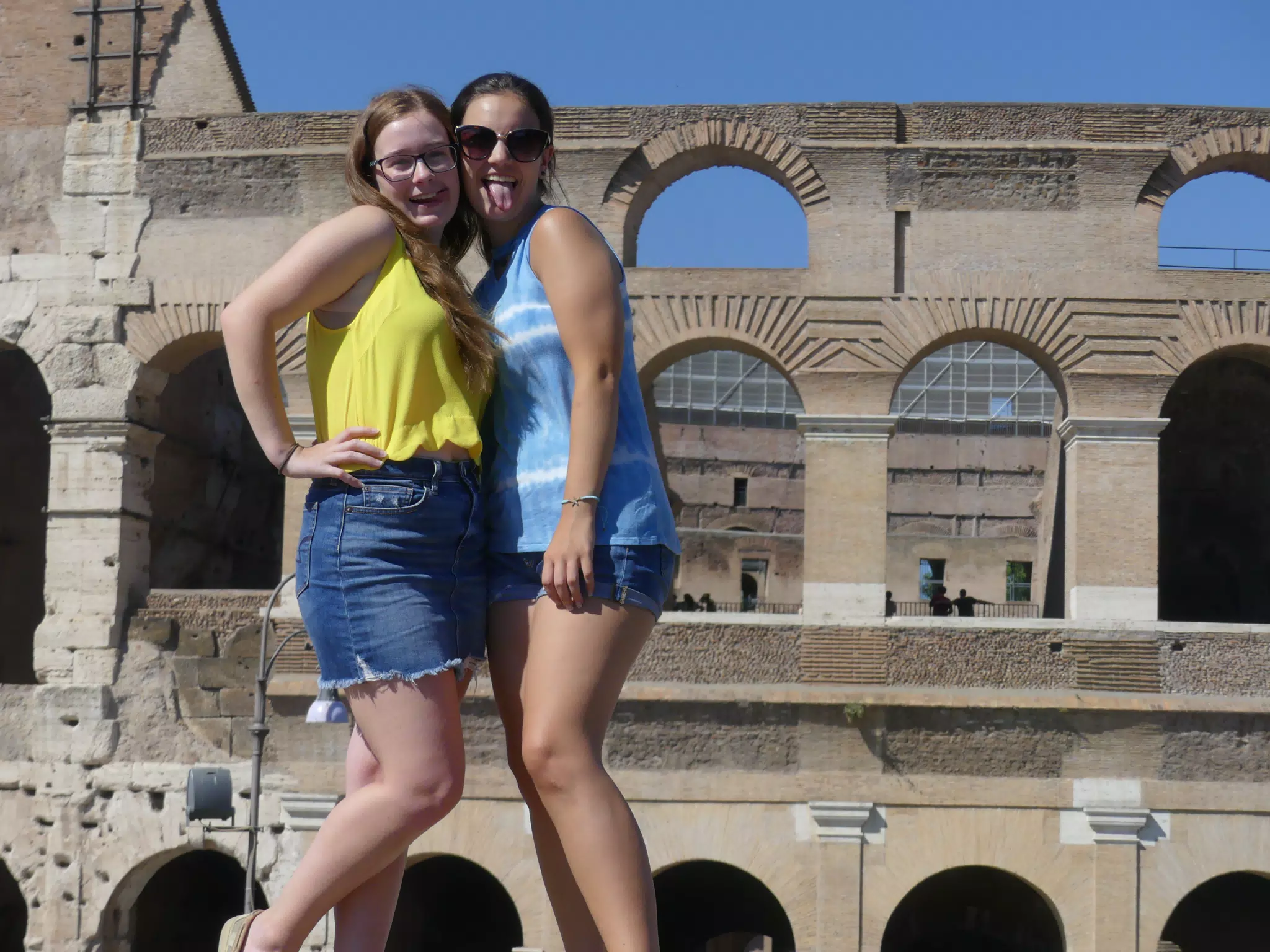 GIrls Sticking Out Tongues at the Colosseum