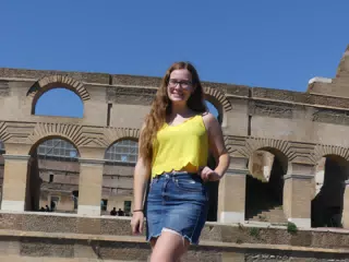 Madeline in Rome at the Colosseum