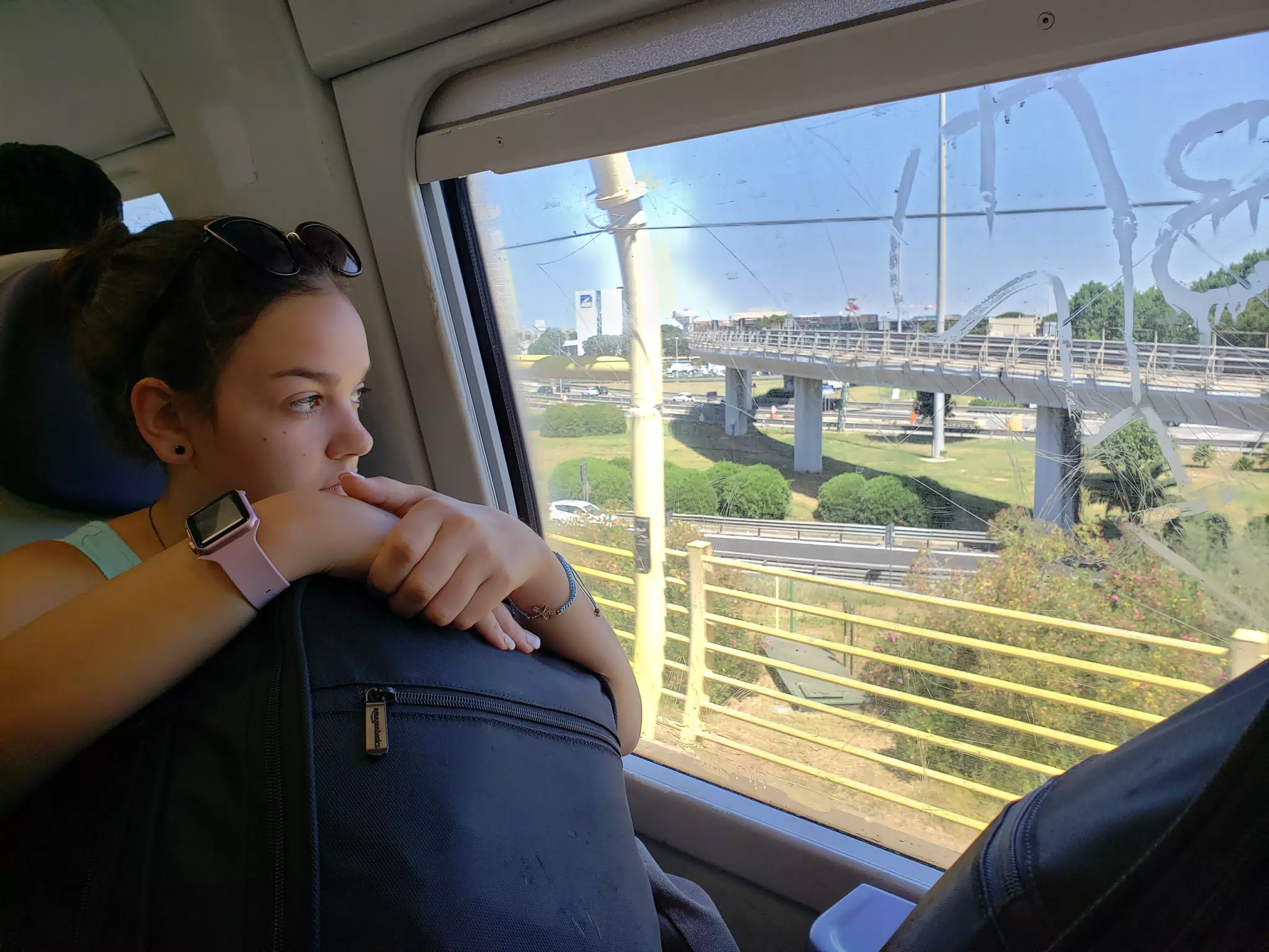 Emily Looking Out Train Windows in Italy