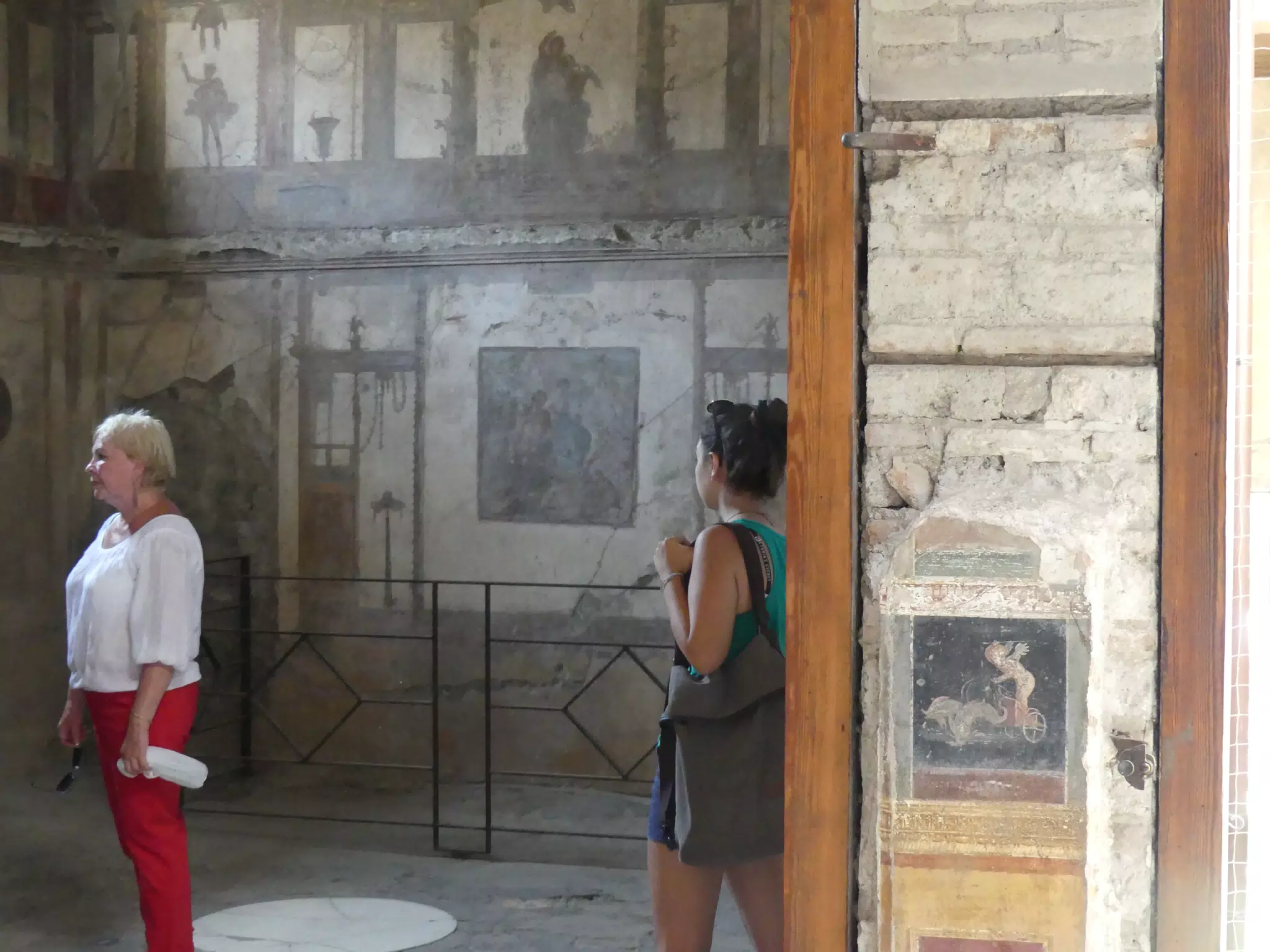 Emily Looking at Pompeii Frescos