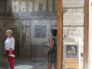 Emily Looking at Pompeii Frescos