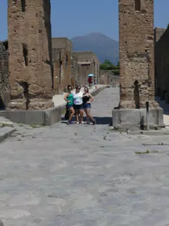 The Girls Posing Under Arch in Pompeii