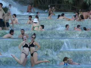 Happy Sisters in the Crowd at Saturnia Waterfalls