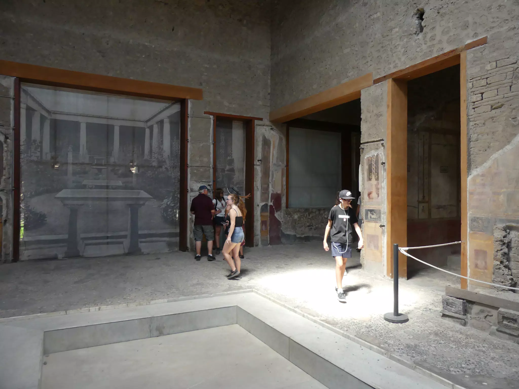 Madeline Exploring Interiors in Pompeii