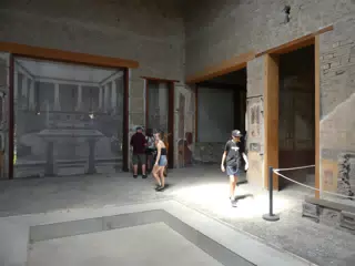 Madeline Exploring Interiors in Pompeii
