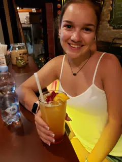 Emily with Cocktail at Bar