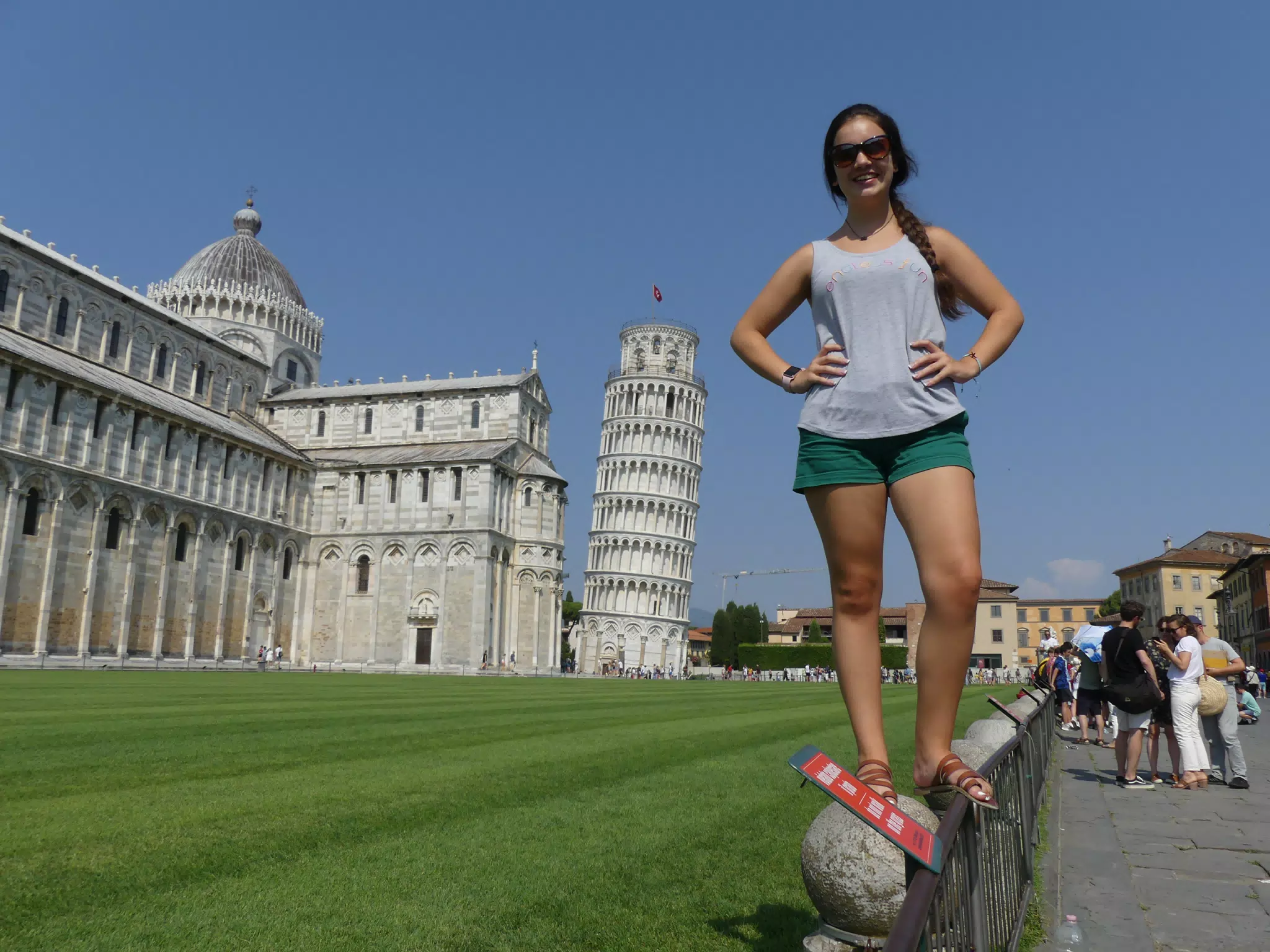 Emily Standing on Fence at Pisa