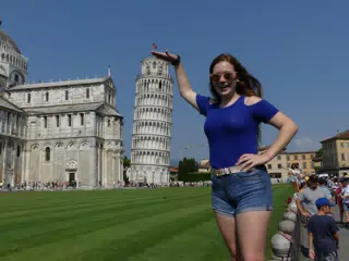 Madeline Holding the Leaning Tower of Pisa