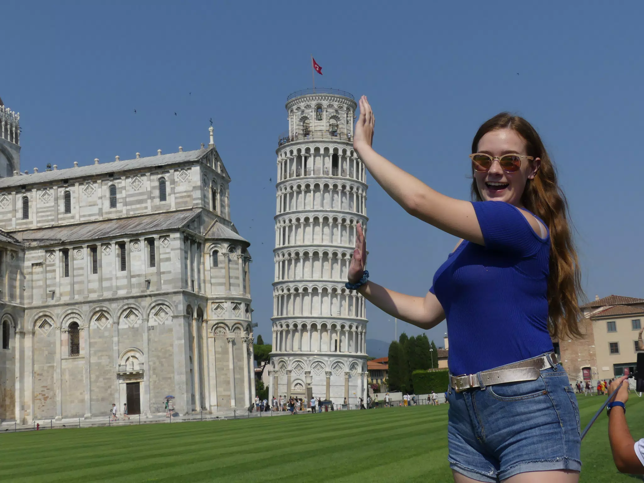 Madeline Holding Up the Leaning Tower of Pisa