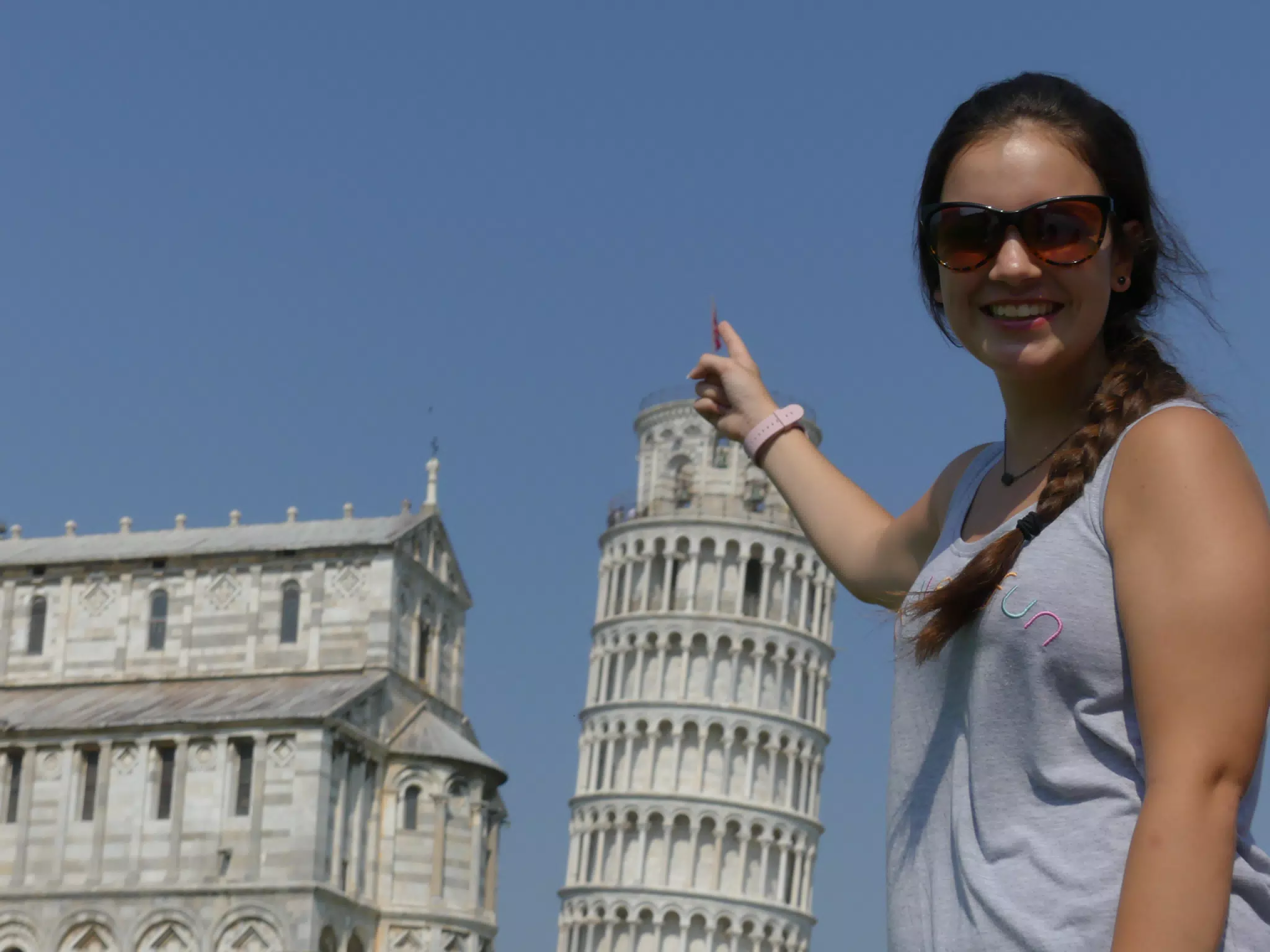 Emily Touching the Top of the Leaning Tower of Pisa