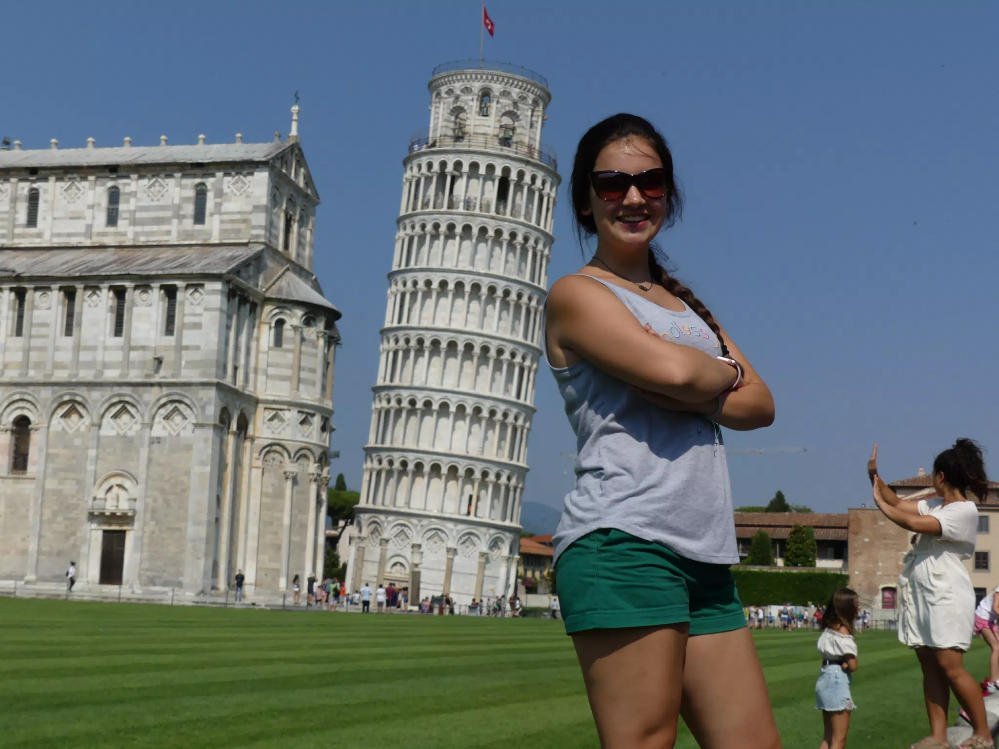 Teen Standing at the Leaning Tower of Pisa