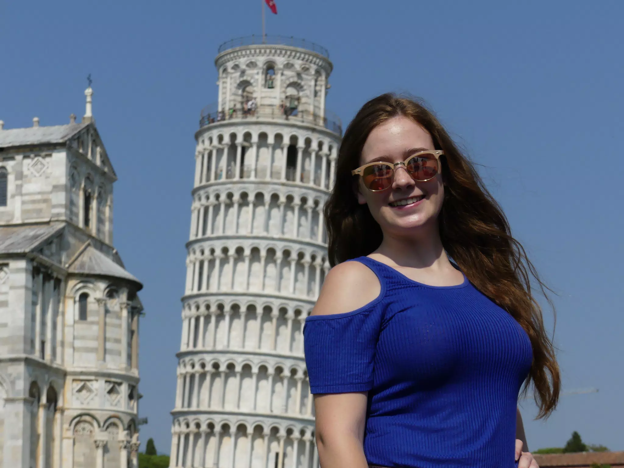 Madeline Posing at the Leaning Tower of Pisa