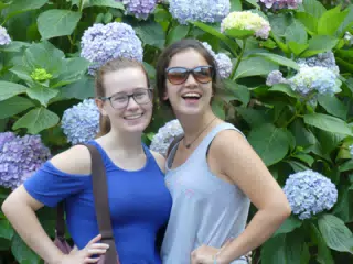 Madeline & Emily by Flowers in Manarola, Italy