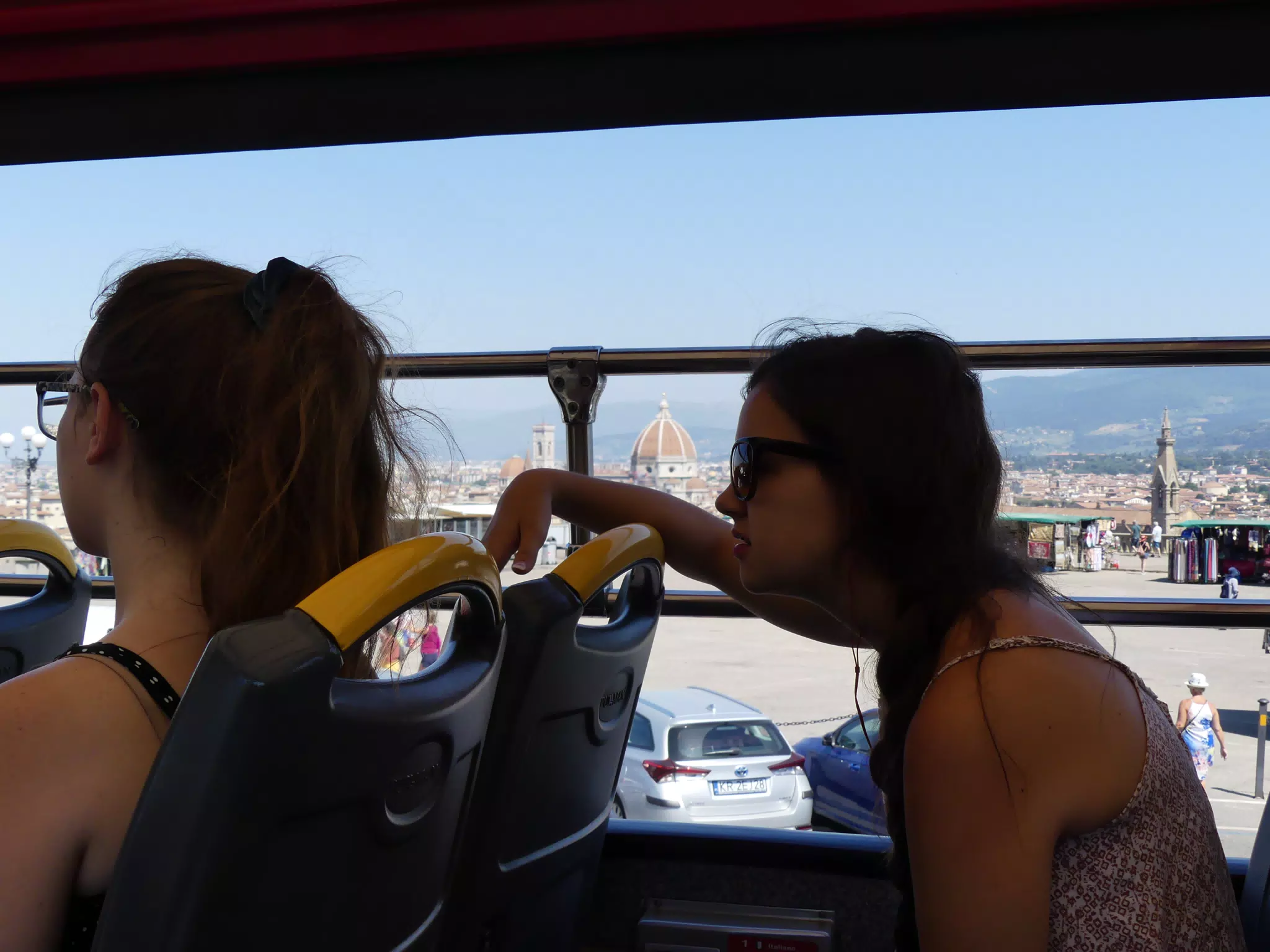 Emily Tired on Bus in Florence with Duomo