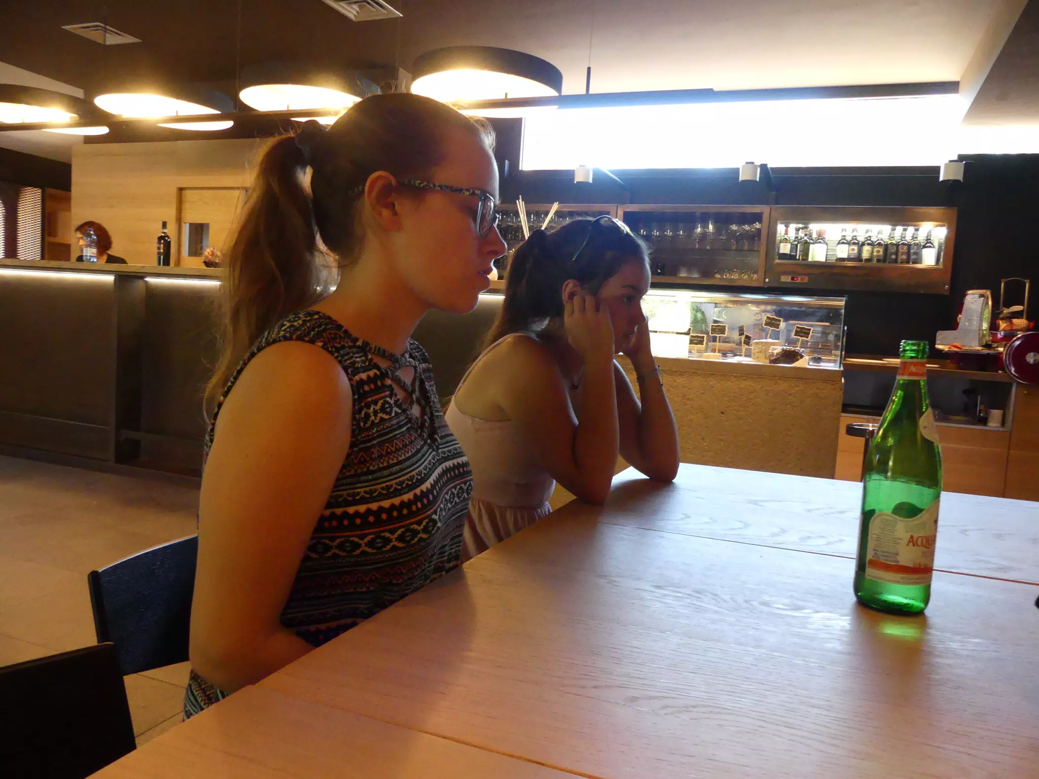 Girls Waiting at Restaurant