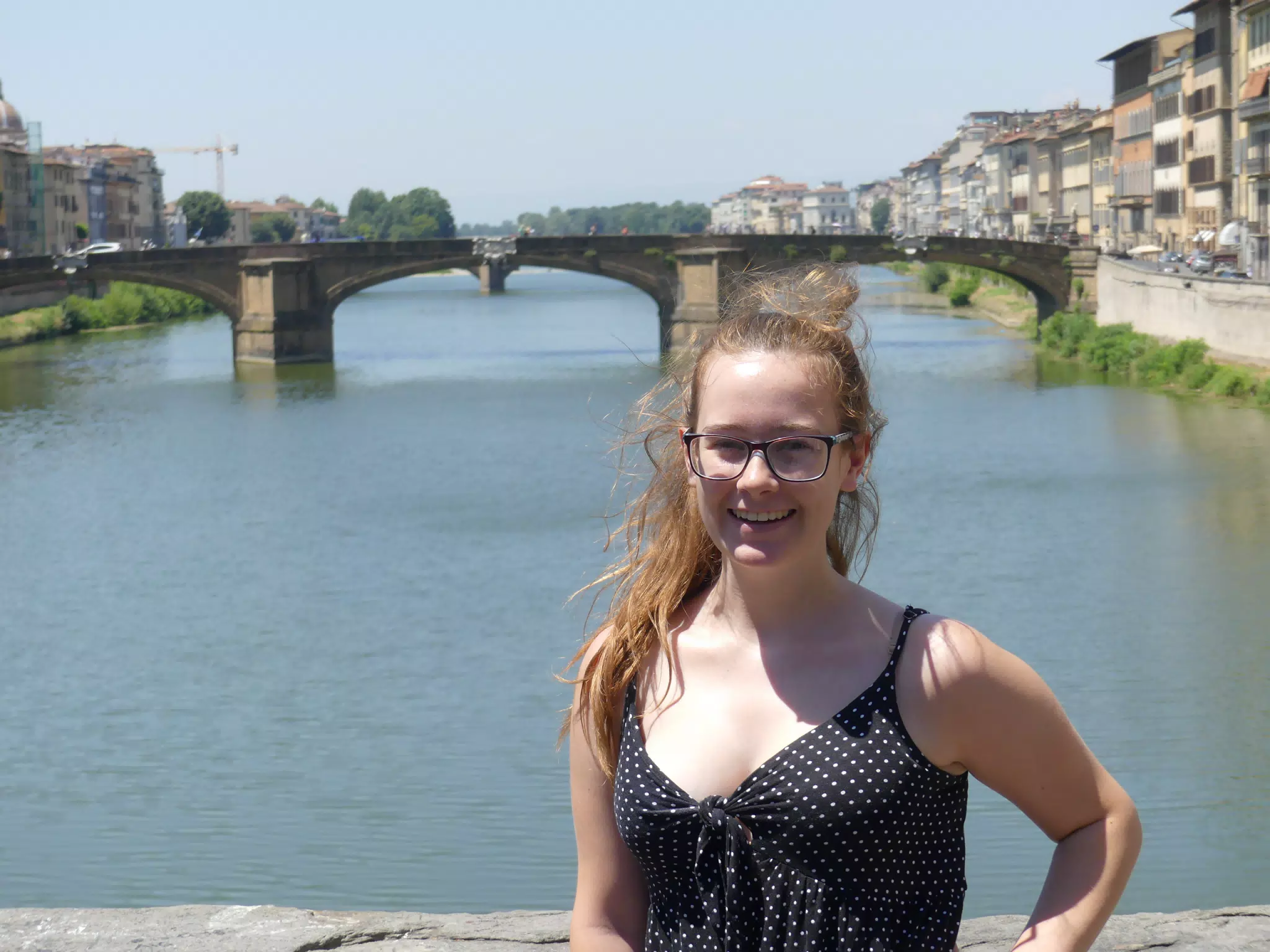Girl Smiling on Bridge in Florence, Italy