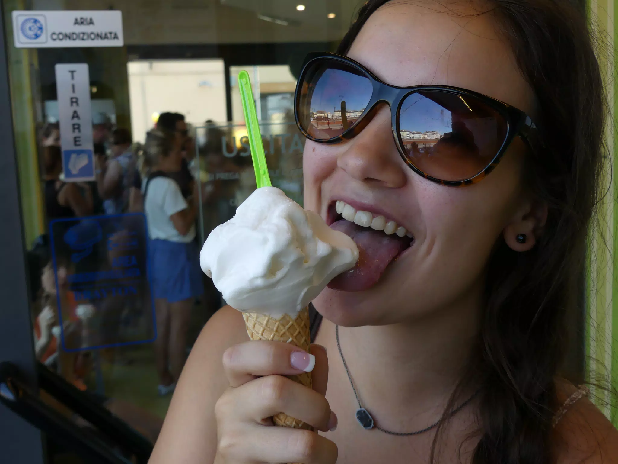 Girl Licking Ice Cream Cone in Sunglasses