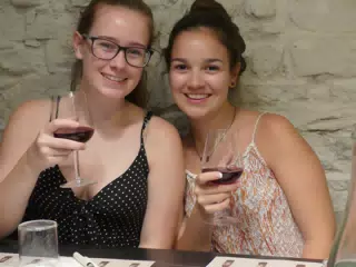 Madeline & Emily Having Wine After Making Their Own Pasta