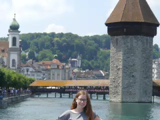 Madeline in Front of Luzern Wooden Bridge