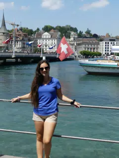 Brunette Teen Leaning on Railing on Bridge in Luzern