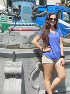 Emily by Fountain in Switzerland