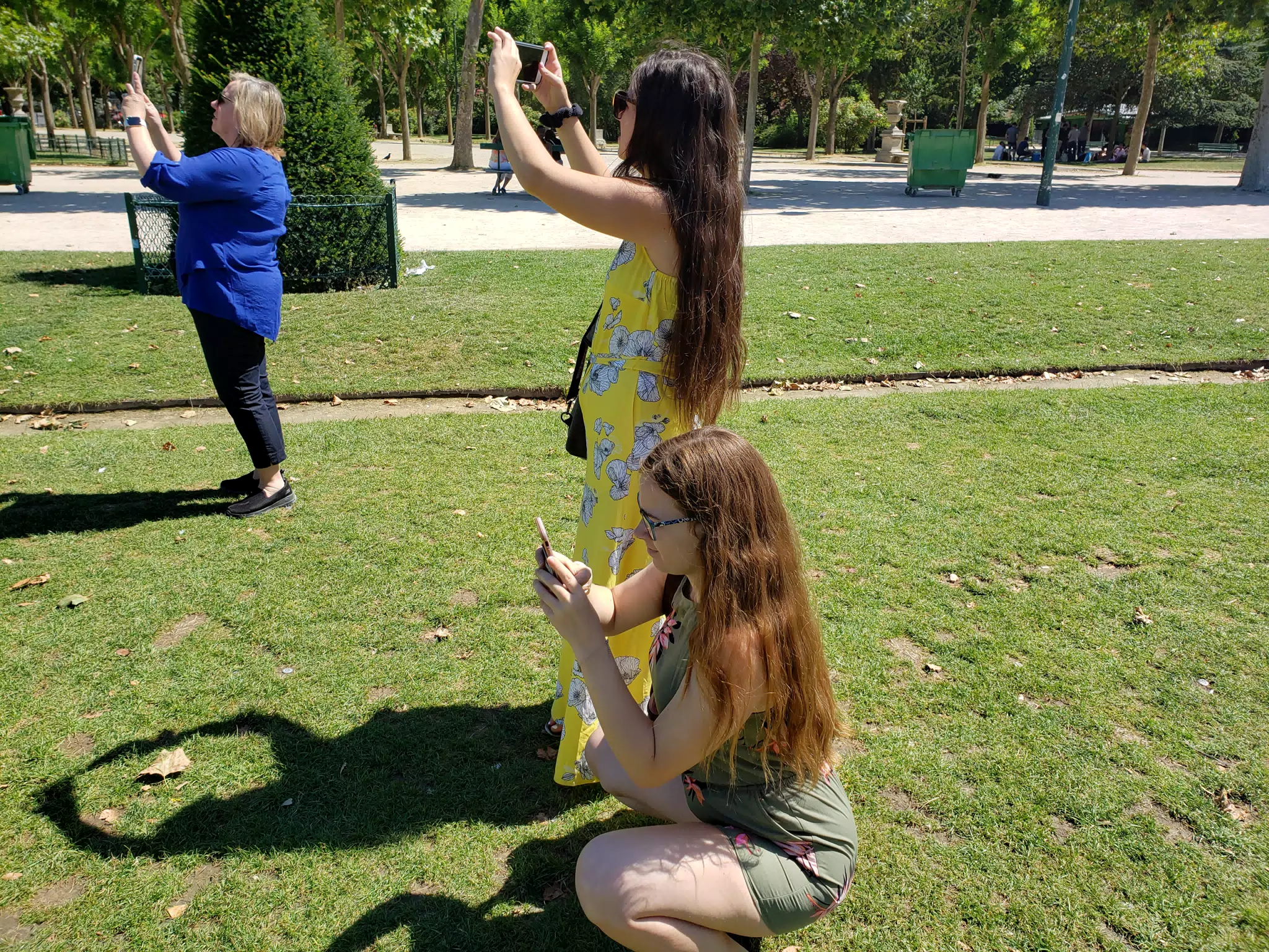 Teens Instagramming the Eiffel Tower in Paris